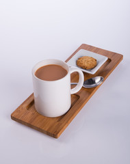 coffee or coffee with cookies on background.