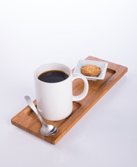 coffee or coffee with cookies on background.