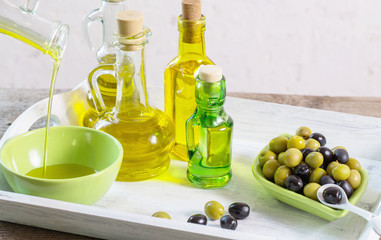 Olive oil  on the wooden table