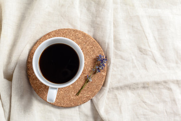 Coffee with flowers composition on the table