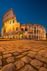 Foto op Plexiglas Colosseum at sunset, Rome. Rome best known architecture and landmark. Rome Colosseum is one of the main attractions of Rome and Italy © RuslanKphoto