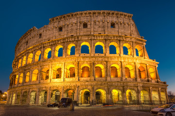 Fototapeta na wymiar Colosseum at sunset, Rome. Rome best known architecture and landmark. Rome Colosseum is one of the main attractions of Rome and Italy