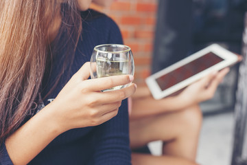 Beautiful young woman sitting in a happy afternoon tea shop.