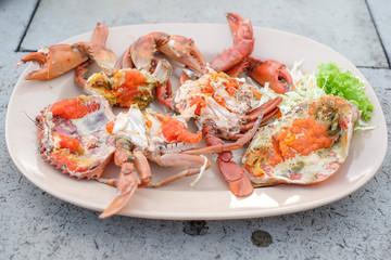 Steamed crabs on a plate on the table