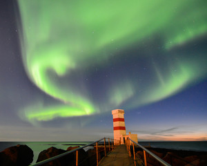 Gardur Lighthouse under aurora borealis, Iceland