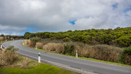 Road curve through volcanic terrain