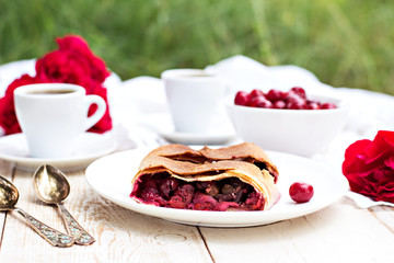 Strudel with a cherry. Cherry pie.