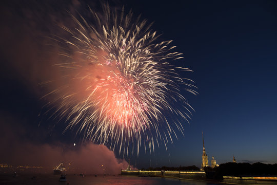 Fireworks over Neva river, Peter and Paul Fortress in the light of the salute