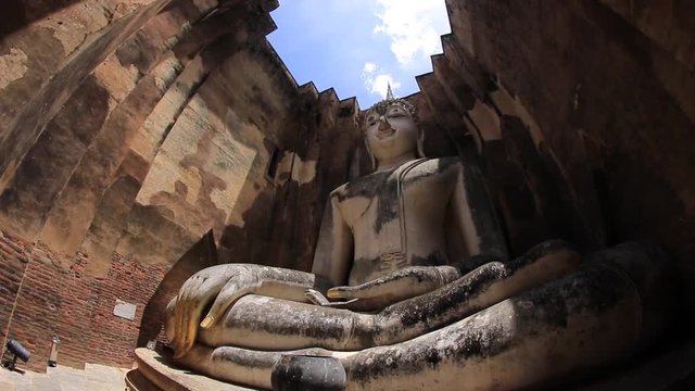 Big buddha at Wat Sri Chum in Sukhothai historical park. It is the landmark of Sukhothai province in Thailand. 