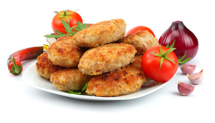 Homemade cutlets with tomato in white plate isolated on white background.