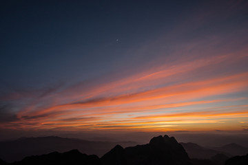 Twilight on top view mountain with moon