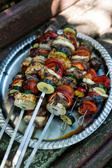 Vegetables and meat skewers 