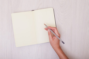 Creative mock up layout made with copy space on table homemade flat lay. Open sketchbook. Hand