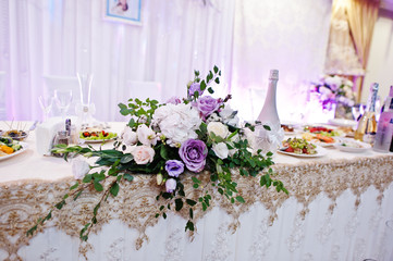 Beautiful floral decorations made for the wedding out of roses and other flowers.