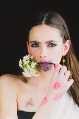 Fototapeta premium Woman has stylish long hair in earrings.