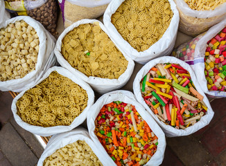 Selling nuts and dried fruits at a bazaar in India