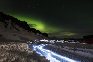 Aurora Borealis in with light effects, in winter