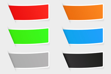 Colored collection of paper labels. Matted stickers on gray background