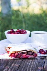 Strudel with a cherry. Cherry pie.