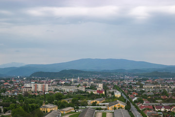 Fototapeta na wymiar Panorama of the city of Mukachevo from walls of fortress of Palanok