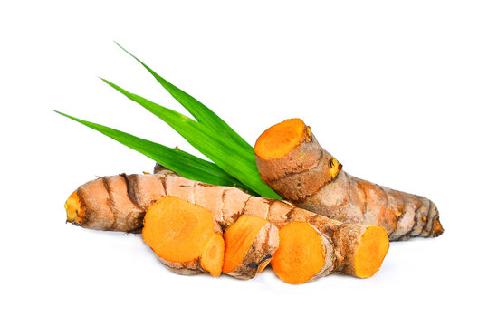 Turmeric Root With Green Leaves Isolated On White Background