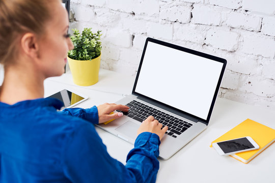 Close Up Of Young Woman Using Laptop Typing Comment Blogging In Stylish Home Office