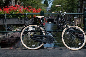 Fototapeta na wymiar Bicycle and flowers, Amsterdam, Netherlands