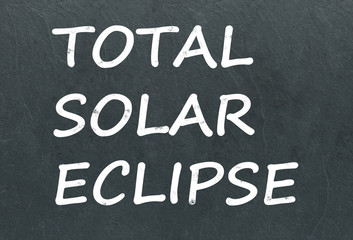 Obraz premium Total Solar Eclipse on a blackboard 