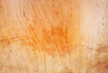 Brown orange stone texture with cracks natural background