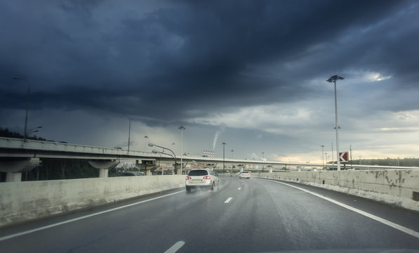 highway junction at the middle of the day. clouds and rain. Moscow