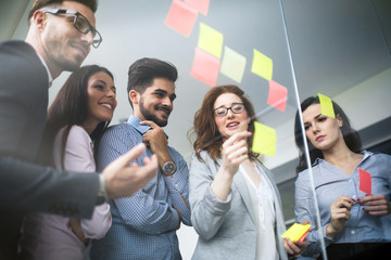 Collaboration and analysis by business people working in office