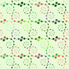 Spiral of color polka on green background