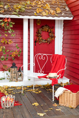 Autumn picnic on the terrace. Veranda of countryside house in autumn season.