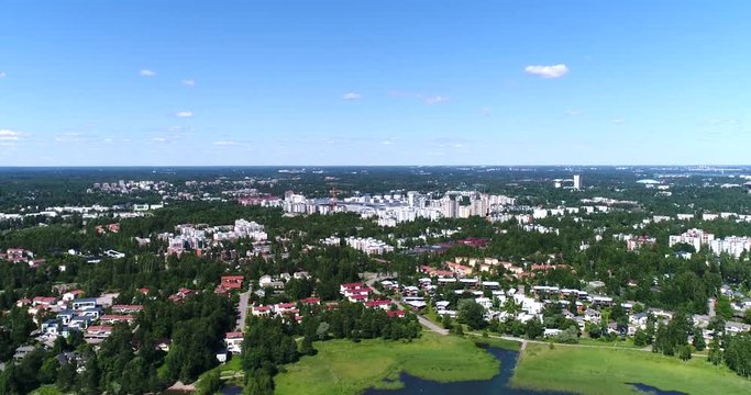 Matinkyla, Cinema 4k aerial view from nuottalahti towards mattby, at a sunny day, in Espoo, Uusimaa, Finland