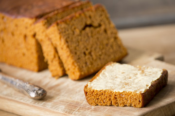 Fototapeta na wymiar Traditional Dutch spice bread or 'ontbijtkoek' with butter
