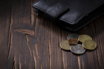Wallet black purse men Vintage wooden background.Business concept
