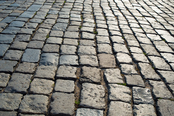 stone pavement in perspective. grey block texture