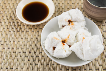 baozi-steamed chinese bun. type of dim sum. popular food appetizer