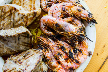 Shrimp and tuna fillet on a plate