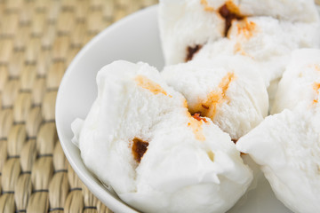 baozi-steamed chinese bun. type of dim sum. popular food appetizer, close up