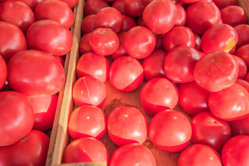 Ripe juicy tomatoes at market