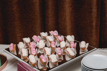 eclairs, traditional french dessert on a glass