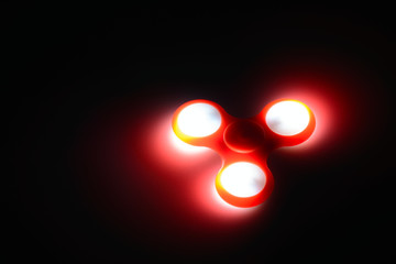 glowing spinner in the dark