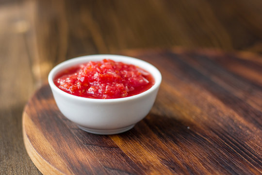 Indian Chutney Or Mexican Salsa In White Ceramic Bowl.