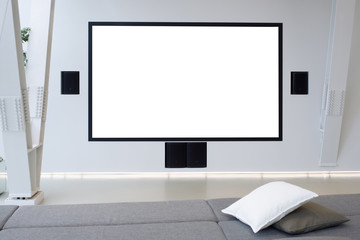 Conference room interior with a white wall and large white scree