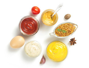 Fototapeta na wymiar tomato sauce, mayonnaise and mustard on white background