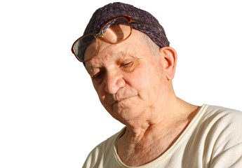 senior man in Knitted hat and glasses isolated on white
