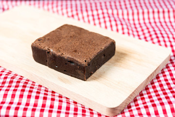 Chocolate Brownie cake on a dark plate