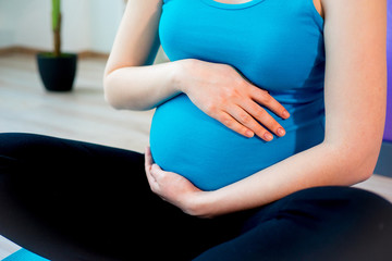 Pregnant woman doing yoga