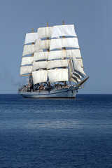 tall ship with wind-filled sails - 166340081